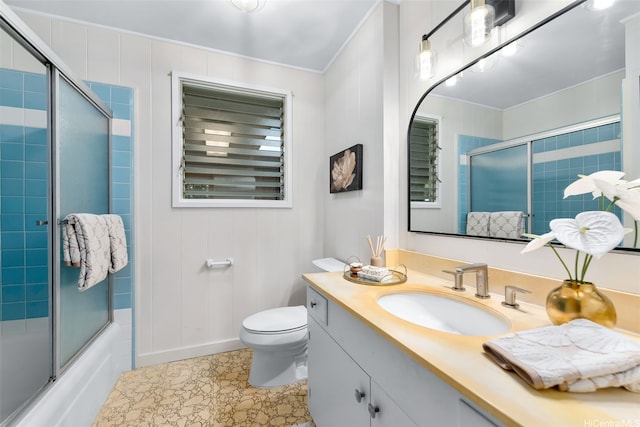 3483 Ala Hinalo St, Honolulu, HI 96818 - bathroom featuring vanity, shower / bath combination with glass door, and ornamental molding