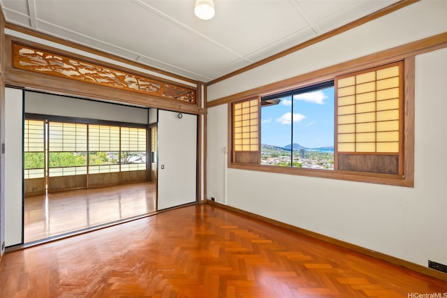 748 Ocean View Dr, Honolulu, HI 96816 - spare room featuring baseboards and a mountain view