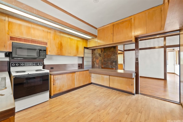 748 Ocean View Dr, Honolulu, HI 96816 - kitchen featuring white electric range, black microwave, and light wood-style flooring