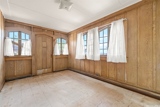 748 Ocean View Dr, Honolulu, HI 96816 - empty room featuring tile patterned floors and wood walls