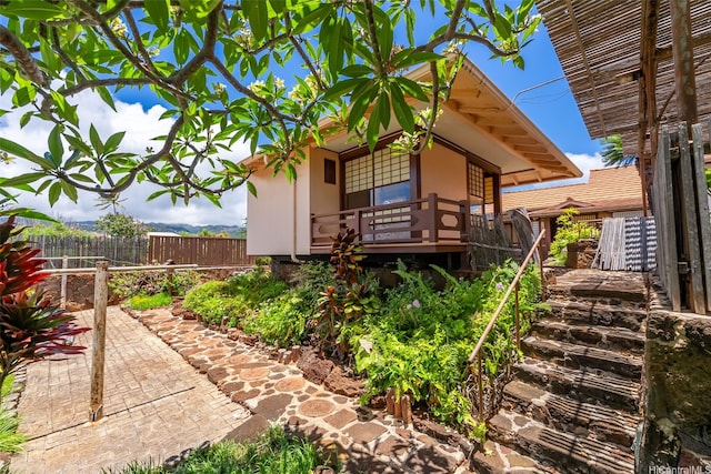 748 Ocean View Dr, Honolulu, HI 96816 - view of side of home with stairs and a wooden deck