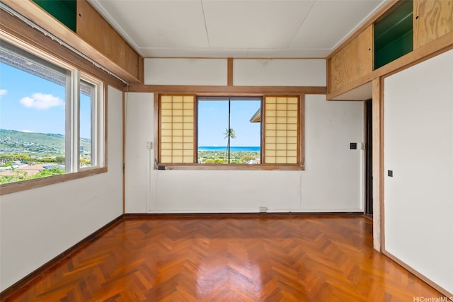 748 Ocean View Dr, Honolulu, HI 96816 - spare room featuring healthy amount of natural light and baseboards