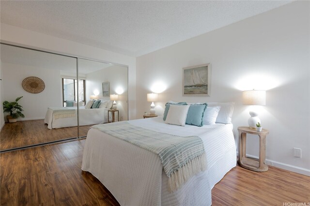 217 Prospect St Unit A14, Honolulu, HI 96813 - bedroom with wood finished floors and a closet