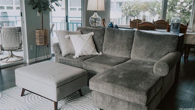 living room with wood finished floors and baseboards