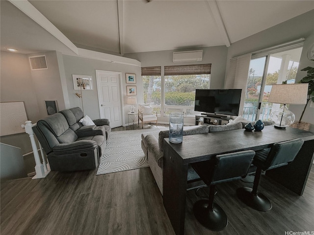 office featuring beam ceiling, wood finished floors, a wall mounted AC, and high vaulted ceiling