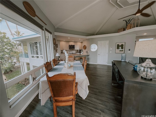 dining room featuring baseboards, dark wood-style flooring, high vaulted ceiling, and a ceiling fan