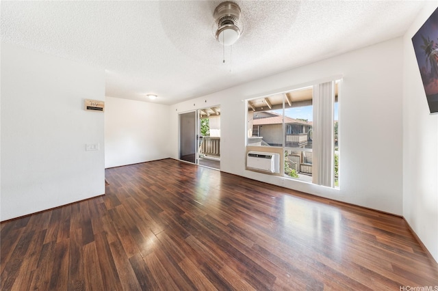 91-1099 Puamaeole St Unit 17U, Ewa Beach, HI 96706 - unfurnished living room featuring wood finished floors, ceiling fan, and a textured ceiling