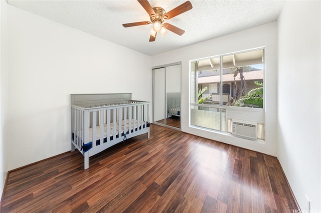 91-1099 Puamaeole St Unit 17U, Ewa Beach, HI 96706 - bedroom featuring wood finished floors, a closet, cooling unit, and a ceiling fan
