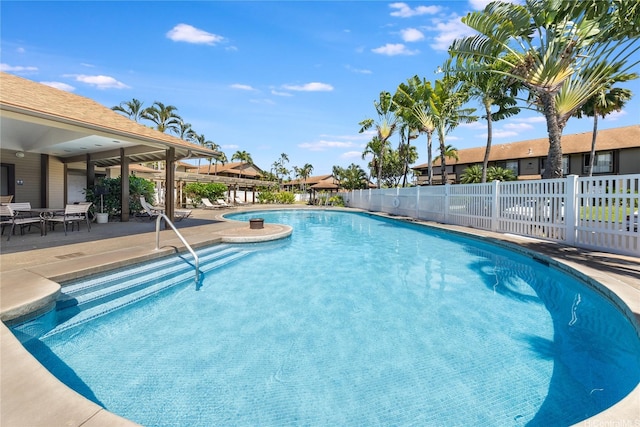 91-1099 Puamaeole St Unit 17U, Ewa Beach, HI 96706 - community pool with a patio area