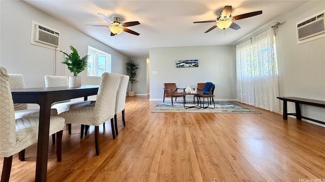 739 Kinalau Pl Unit 1, Honolulu, HI 96813 - dining space with a ceiling fan, a wall mounted AC, light wood-type flooring, and baseboards