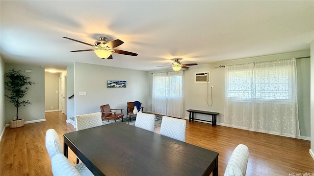 739 Kinalau Pl Unit 1, Honolulu, HI 96813 - dining area with a wall mounted AC, wood finished floors, and ceiling fan