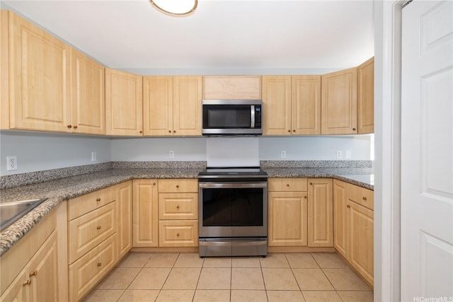 739 Kinalau Pl Unit 1, Honolulu, HI 96813 - kitchen featuring stainless steel appliances, light brown cabinets, and light tile patterned flooring