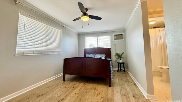 739 Kinalau Pl Unit 1, Honolulu, HI 96813 - bedroom featuring ornamental molding, light wood-style flooring, a wall unit AC, baseboards, and ensuite bath