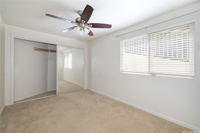 739 Kinalau Pl Unit 1, Honolulu, HI 96813 - unfurnished bedroom with carpet, a closet, and ceiling fan