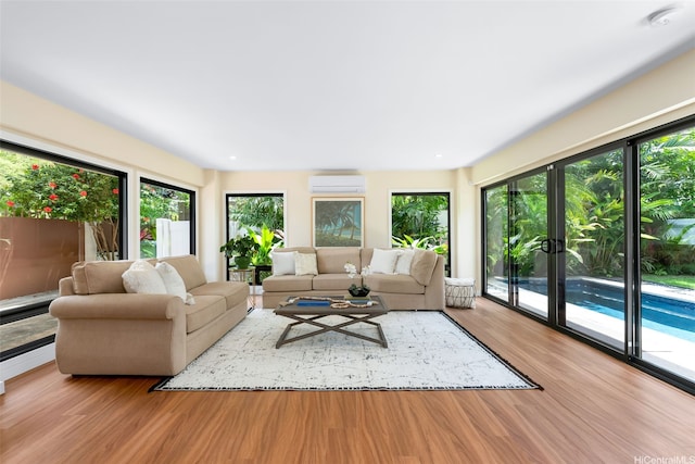 3002 Diamond Head Rd, Honolulu, HI 96815 - living area with wood finished floors and a wall unit AC