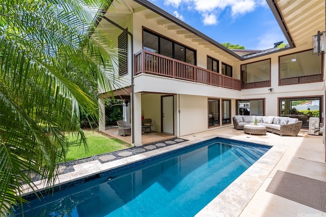 3002 Diamond Head Rd, Honolulu, HI 96815 - rear view of house with outdoor lounge area, a balcony, a patio, an outdoor pool, and stucco siding