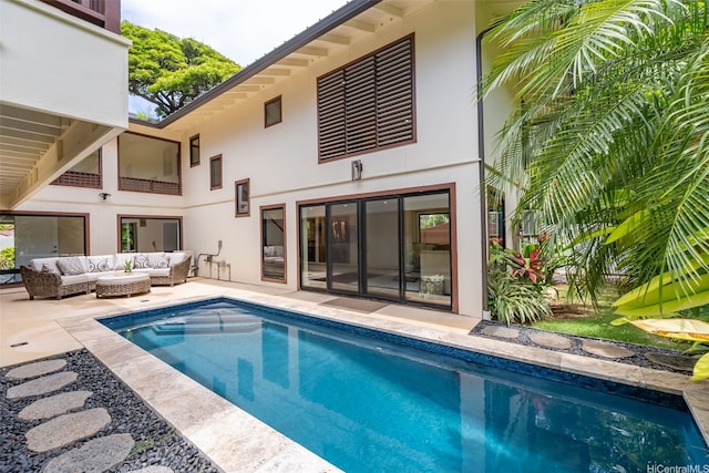 3002 Diamond Head Rd, Honolulu, HI 96815 - back of house with outdoor lounge area, stucco siding, a patio, and an outdoor pool