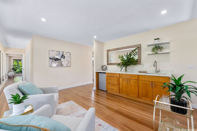 3002 Diamond Head Rd, Honolulu, HI 96815 - living room with bar with sink, light wood-style flooring, recessed lighting, and baseboards