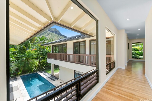 3002 Diamond Head Rd, Honolulu, HI 96815 - hallway with a mountain view, wood finished floors, baseboards, and recessed lighting