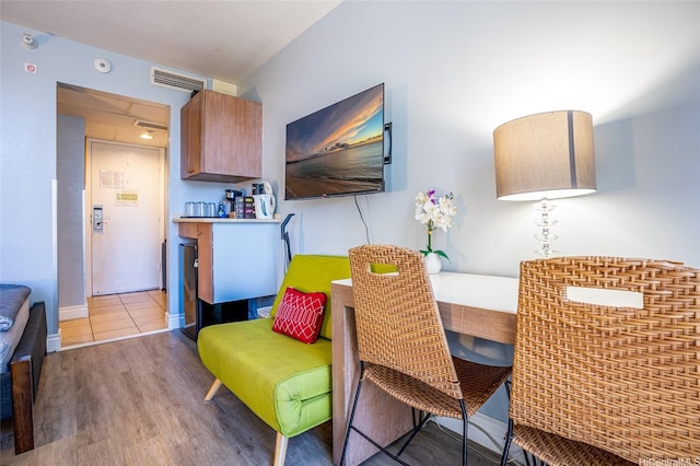 1850 Ala Moana Blvd Unit 603, Honolulu, HI 96815 - dining space featuring light wood-style floors and baseboards