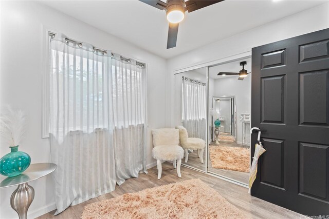 87-888 Waapuhi St, Waianae, HI 96792 - sitting room with ceiling fan, wood finished floors, and baseboards