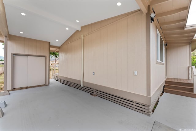 87-888 Waapuhi St, Waianae, HI 96792 - garage featuring wooden walls and recessed lighting