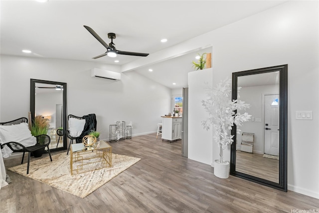 87-888 Waapuhi St, Waianae, HI 96792 - living area with a wall unit AC, ceiling fan, wood finished floors, recessed lighting, and baseboards