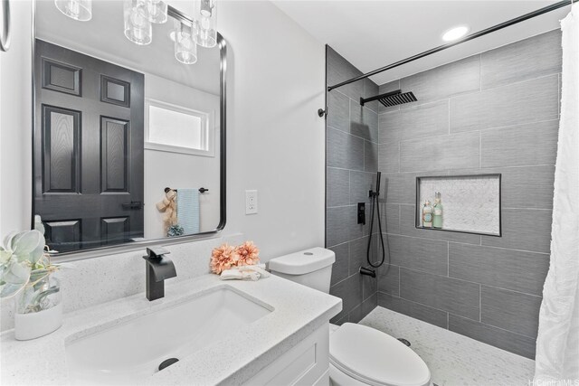 87-888 Waapuhi St, Waianae, HI 96792 - full bath with toilet, tiled shower, vanity, and recessed lighting