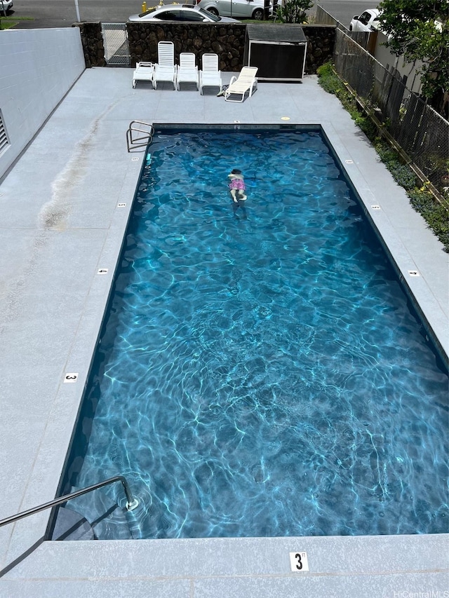 1333 Heulu St Unit 408, Honolulu, HI 96822 - community pool featuring a patio area