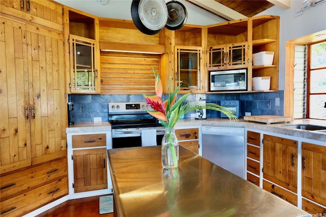 51-416 Kamehameha Hwy Unit A, Kaaawa, HI 96730 - kitchen with appliances with stainless steel finishes, stainless steel countertops, open shelves, decorative backsplash, and a sink