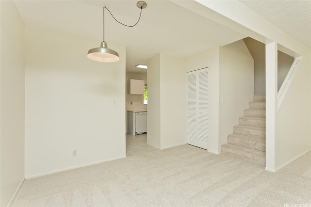 44-3504 Olina St Unit 34, Kaneohe, HI 96744 - unfurnished room featuring light carpet, stairs, and baseboards