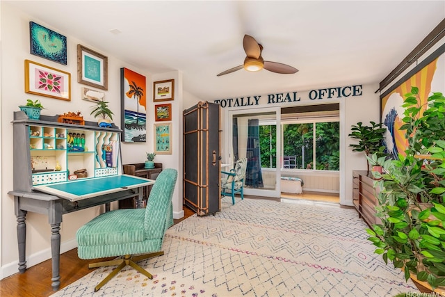 1149 Maunawili Rd, Kailua, HI 96734 - office space with ceiling fan, wood finished floors, and baseboards