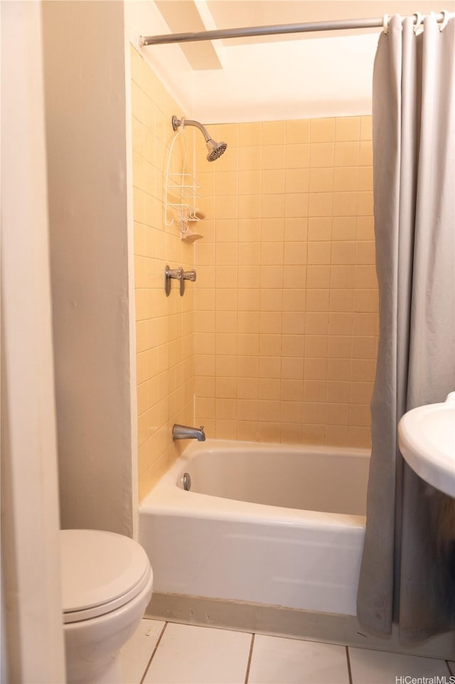 134 Kapahulu Ave Unit 707, Honolulu, HI 96815 - full bathroom featuring shower / tub combo with curtain, toilet, and tile patterned flooring