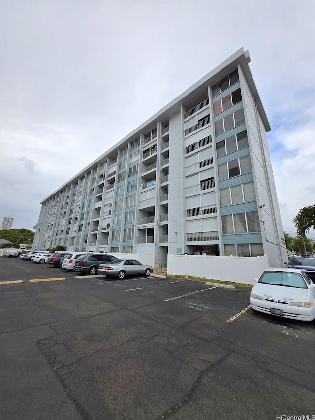 910 Kapahulu Ave Unit 303, Honolulu, HI 96816 - view of apartment building / complex featuring uncovered parking