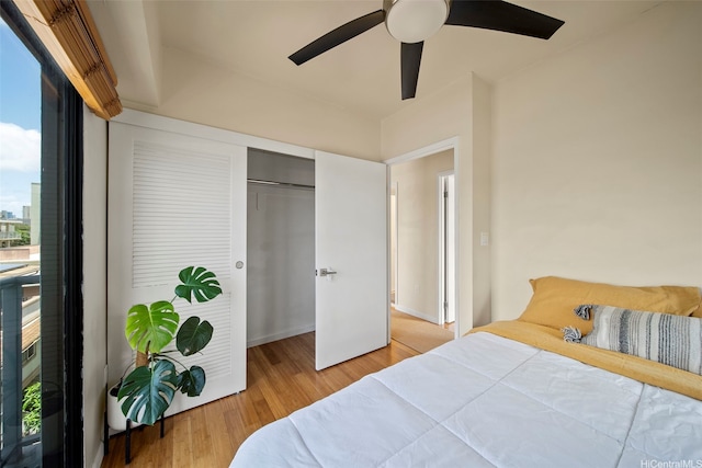 738 Palani Ave Unit 401, Honolulu, HI 96816 - bedroom featuring wood finished floors, a ceiling fan, and a closet