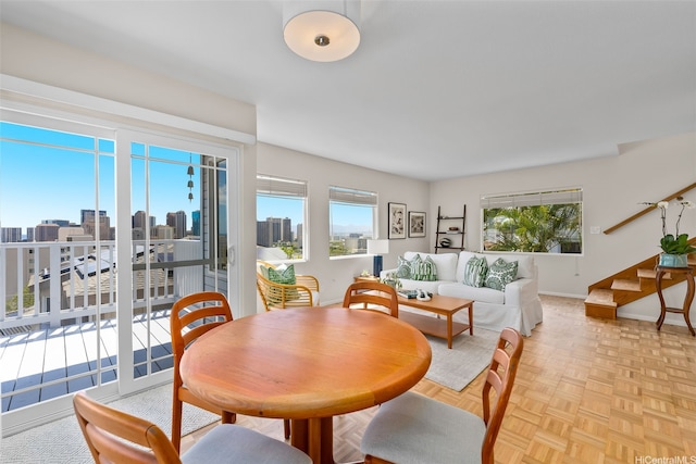 521 Prospect St, Honolulu, HI 96813 - dining area with stairs, baseboards, and a view of skyline