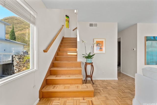 521 Prospect St, Honolulu, HI 96813 - stairway featuring baseboards