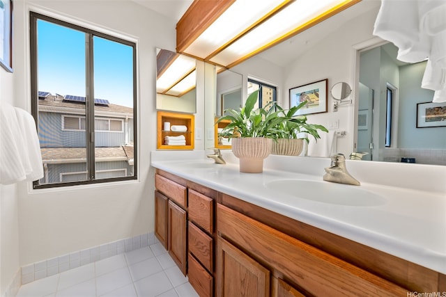521 Prospect St, Honolulu, HI 96813 - bathroom with plenty of natural light, double vanity, tile patterned flooring, and baseboards