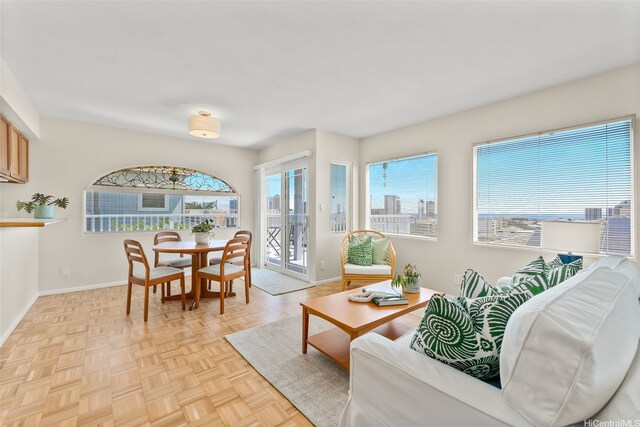 521 Prospect St, Honolulu, HI 96813 - living area featuring baseboards and plenty of natural light