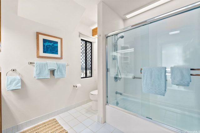 521 Prospect St, Honolulu, HI 96813 - full bath with toilet, tile patterned flooring, bath / shower combo with glass door, and baseboards