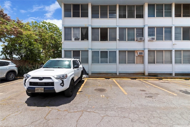 94-249 Waikele Rd Unit A304, Waipahu, HI 96797 - view of building exterior featuring uncovered parking