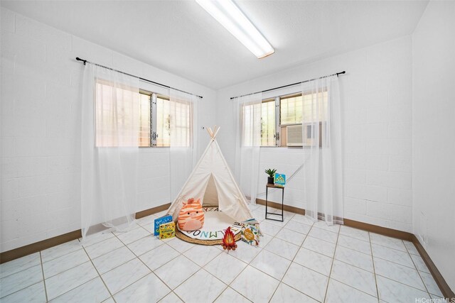 94-860 Kuhaulua St, Waipahu, HI 96797 - recreation room featuring baseboards and cooling unit