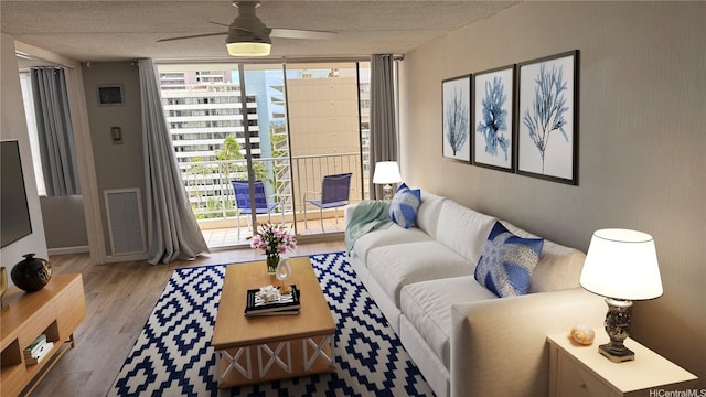 400 Hobron Ln Unit 1109, Honolulu, HI 96815 - living room featuring a wall of windows, wood finished floors, a textured ceiling, ceiling fan, and baseboards