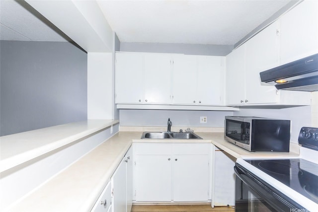 400 Hobron Ln Unit 1109, Honolulu, HI 96815 - kitchen with range with electric stovetop, a sink, stainless steel microwave, light countertops, and under cabinet range hood