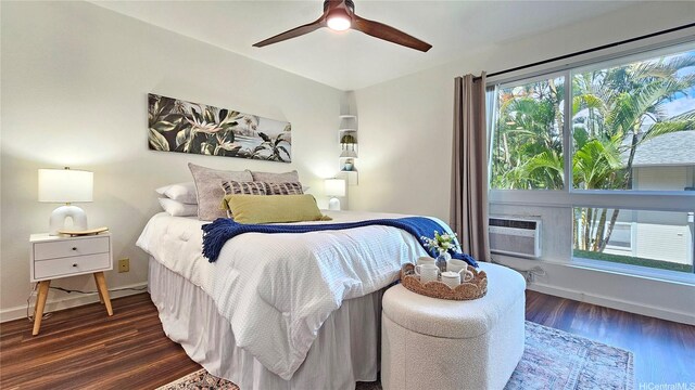 95-786 Wikao St Unit M103, Mililani, HI 96789 - bedroom featuring multiple windows, wood finished floors, a ceiling fan, and a wall mounted AC