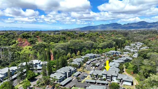 95-786 Wikao St Unit M103, Mililani, HI 96789 - aerial view of property and surrounding area featuring nearby suburban area and a mountain backdrop