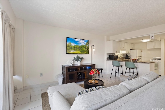 1777 Ala Moana Blvd Unit 1517, Honolulu, HI 96815 - living room with light tile patterned floors and a textured ceiling