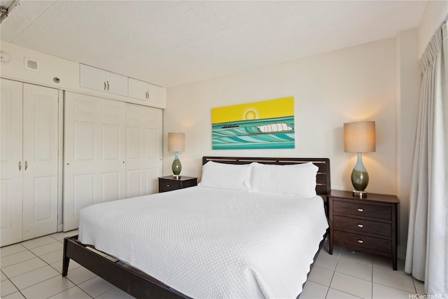 1777 Ala Moana Blvd Unit 1517, Honolulu, HI 96815 - bedroom featuring light tile patterned flooring and a closet
