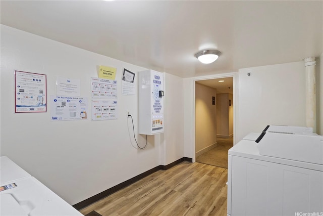 1777 Ala Moana Blvd Unit 1517, Honolulu, HI 96815 - community laundry room featuring light wood-style floors and washer and clothes dryer