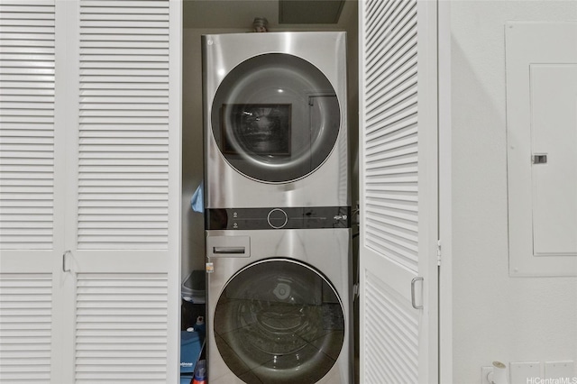 1166 Kukulu St Unit 706, Kapolei, HI 96707 - clothes washing area featuring stacked washer / dryer and electric panel